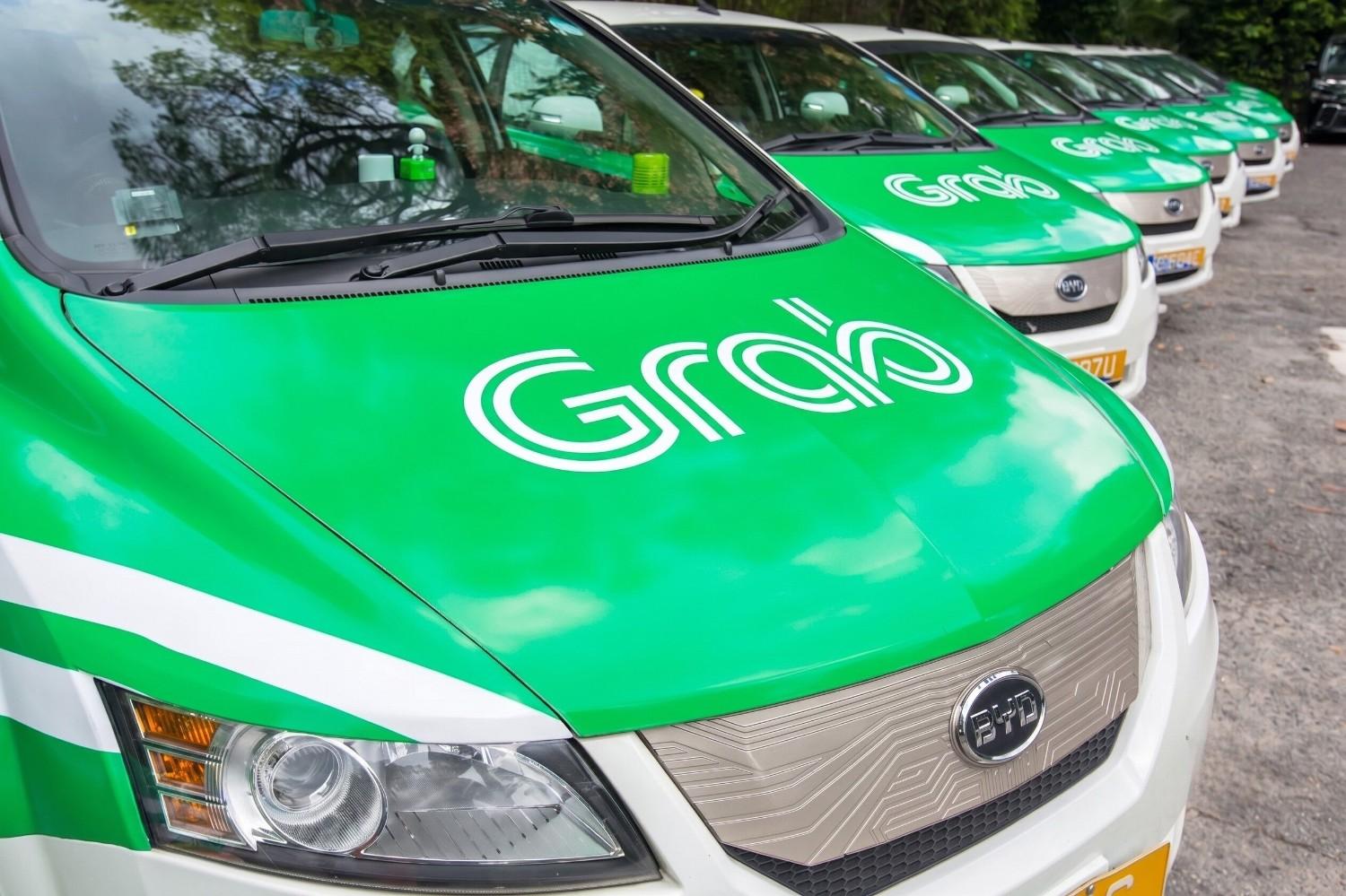 A Fleet Of Grab Taxis From A Ride Hailing App In Myanmar