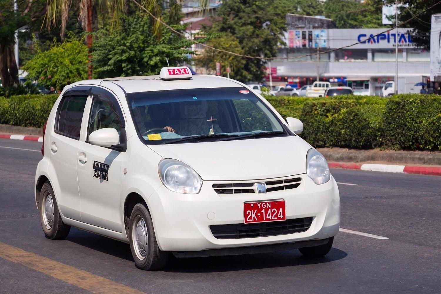A Taxi Car Driving In Myanmar