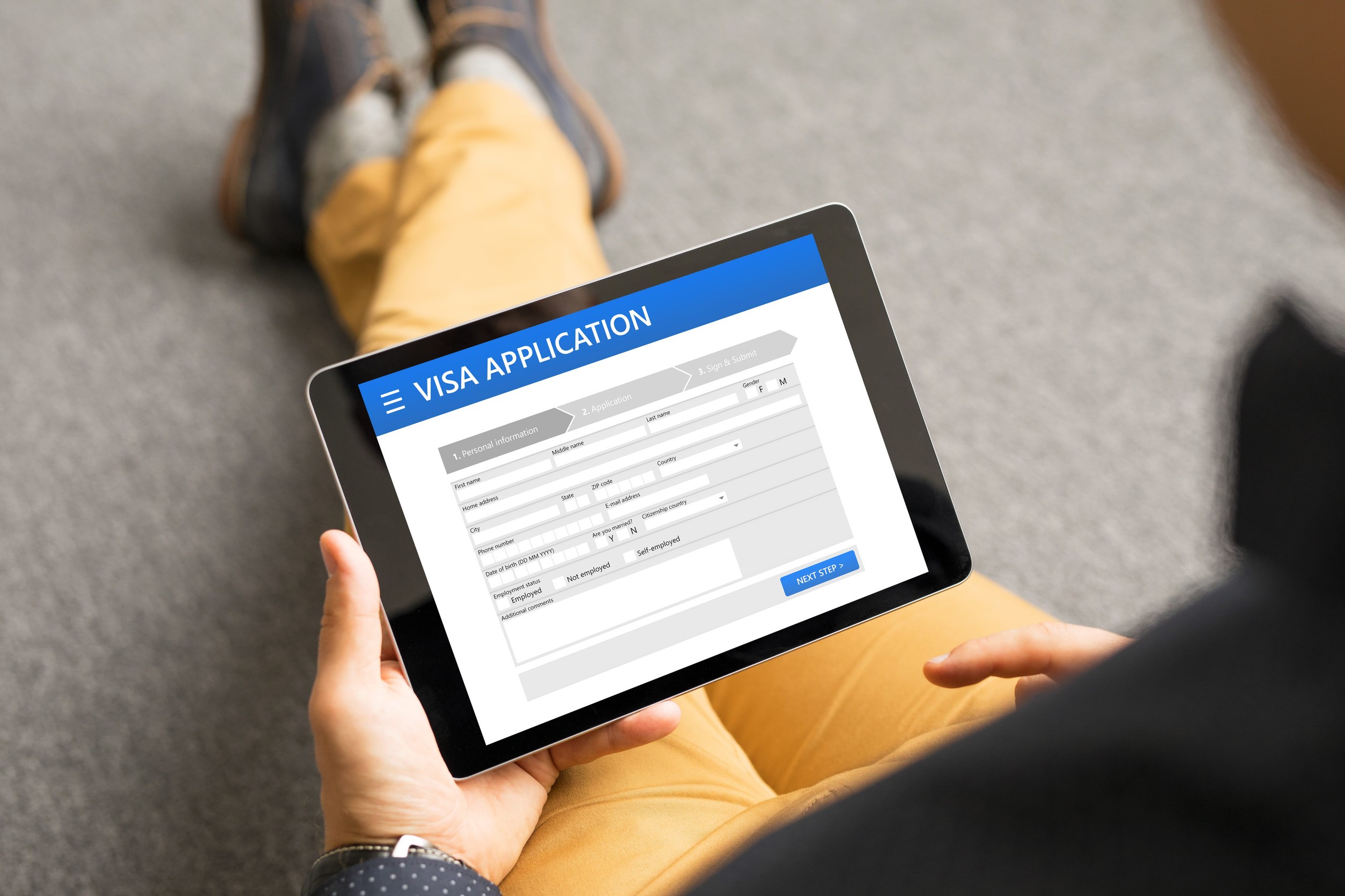 An Applicant Applying For An Evisa From A Tablet