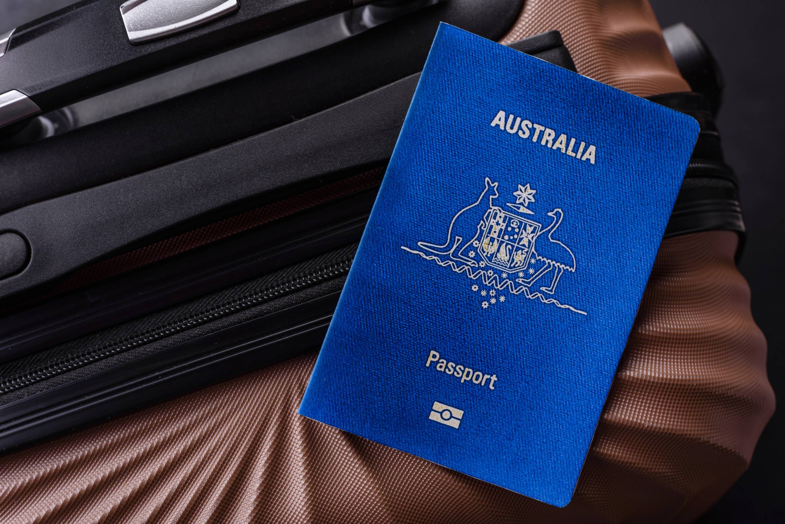 International Passport of a Citizen of Australia on a Suitcase Departure from the Airport