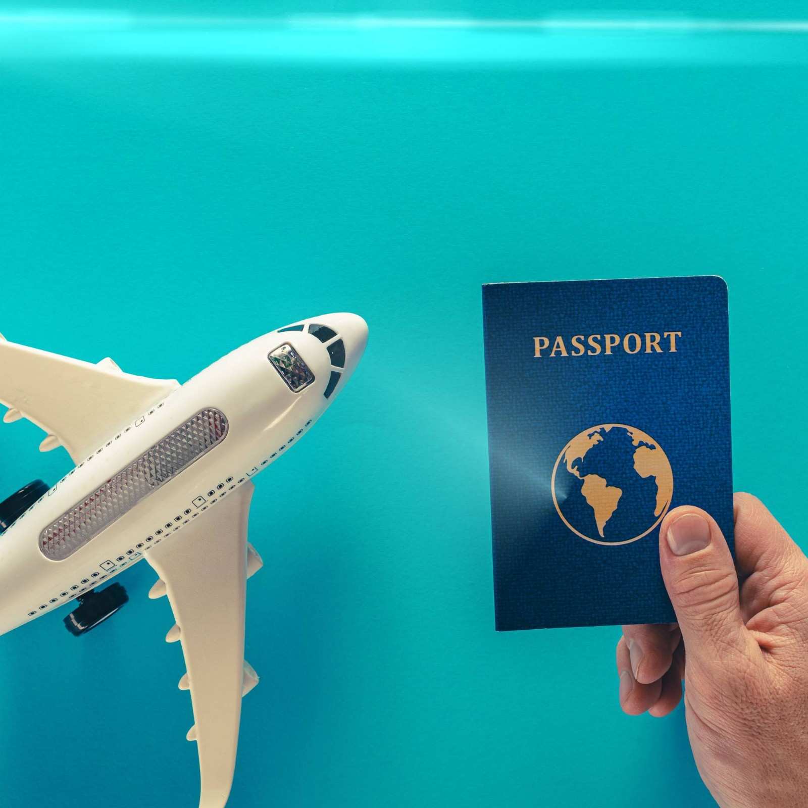 Man Holding In Hand His Passport For Travel