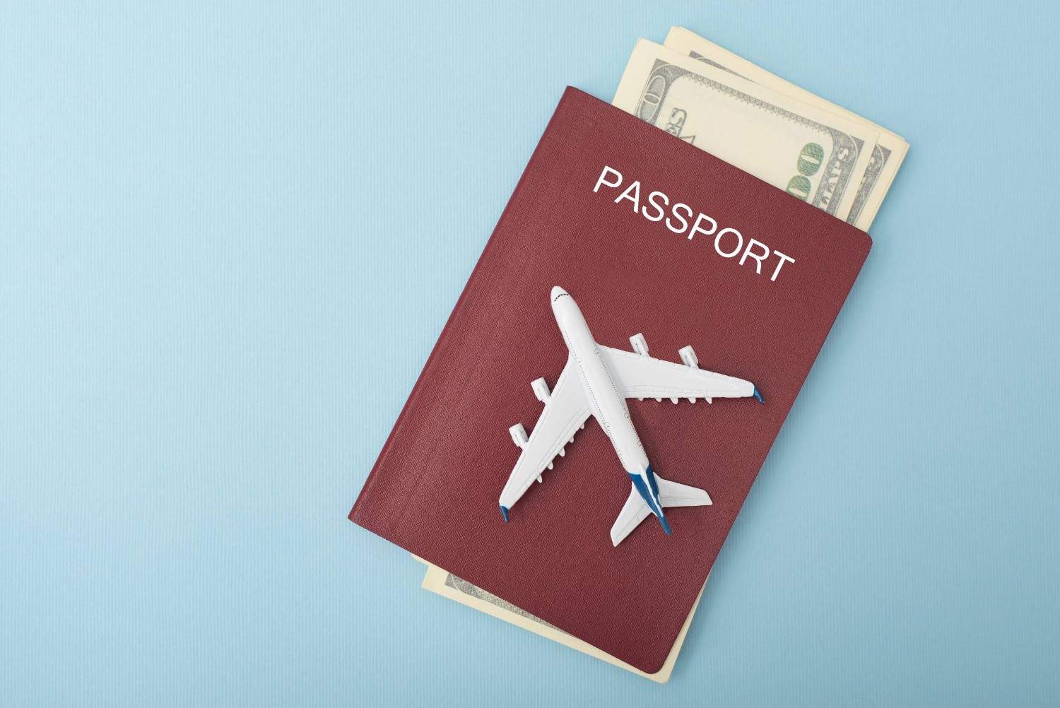 Mini Airplane On The Passport