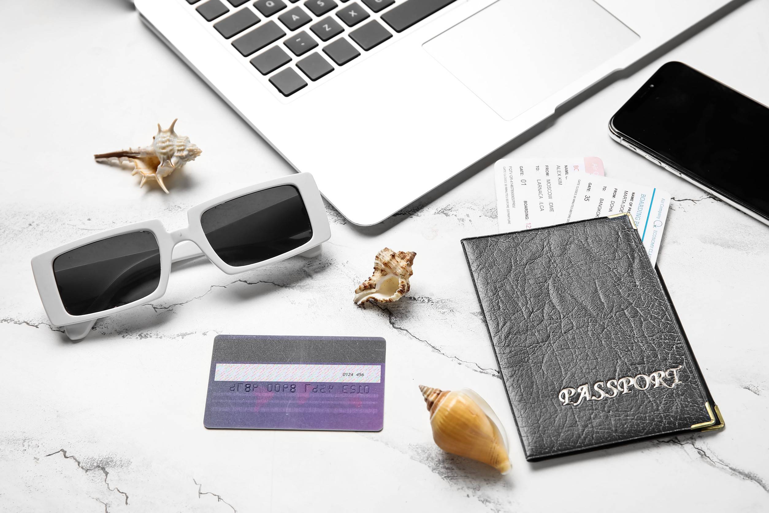 Passport With Laptop Travel Tickets Credit Card And Glasses